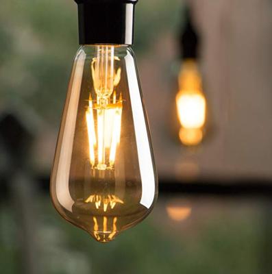 China Amber Glass LED Filament Bulb ST64 4W 8W Dimmable 220 Volt 2200k for sale