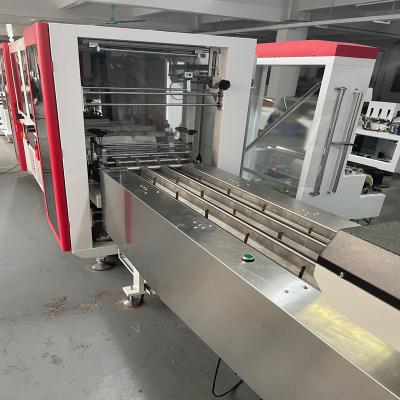 China KF94 Surgical Mask Packaging Machine Four Side Sealing Packing Machine 150 Pieces / Min for sale