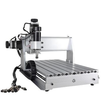 中国 パンタグラフ3000W CNCの彫版機械M2513 3D木フライス盤 販売のため