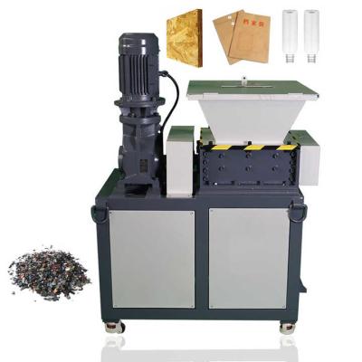China 1000kg/h Recycling Crusher Machine Double Shaft Plastic Bottle Mobile Scrap Shredder for sale