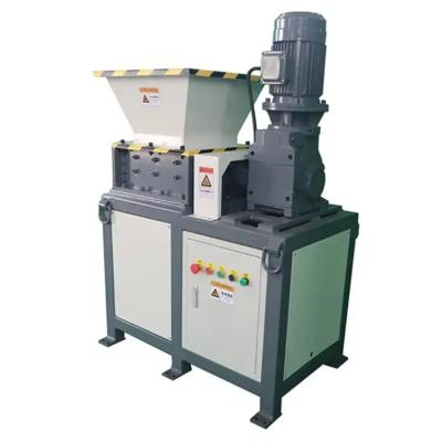 China Máquina compacta de trituração de placas de PCB de eixo duplo para resíduos de aço à venda