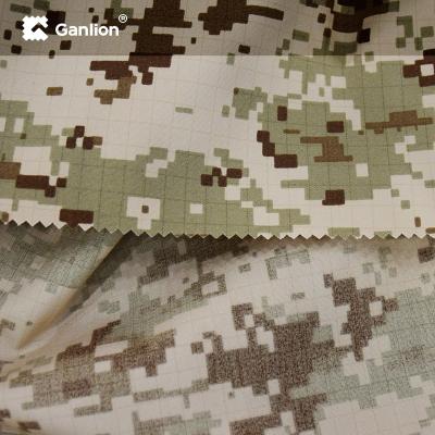 China WR OR Flame Retardant Cotton Waterproof Camo Fabric Plain Weave for sale