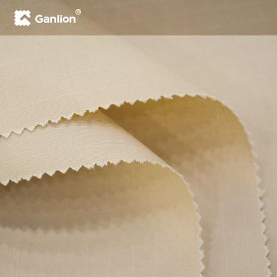 China Khaki Polyester Cotton Spandex Stretch Woven Teflon Fabric Ripstop 2*2 for sale