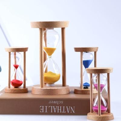 China Three Pillar Wooden Hourglass Customized Antique Sand Timer for Gift for sale