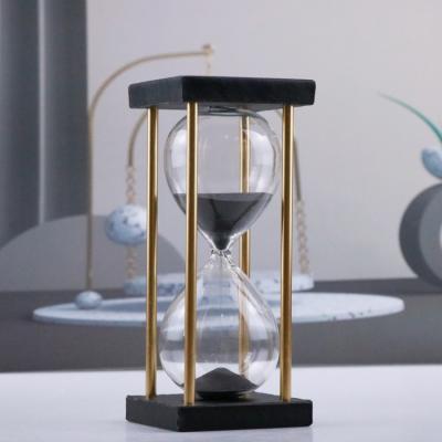 China Contador de tiempo minucioso del reloj de arena del reloj de arena 25 de madera coloridos para los artículos para el hogar en venta