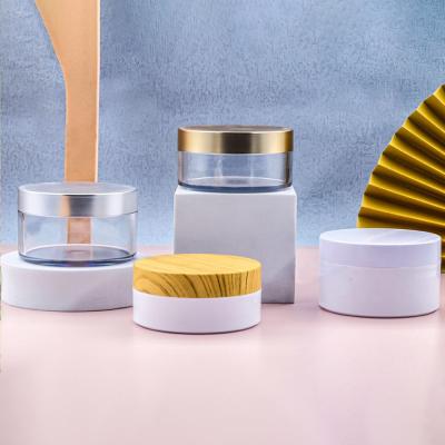 China PET Plastic Cream Jars Clear Luxury Frosted Vacuum Cream Jar for sale