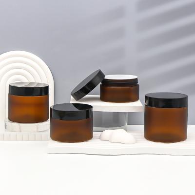 China Brown Clear Airtight Round PET Containers Plastic Spice Jars With Lids for sale