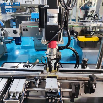 China Máquina taponadora de rosca automática de control PLC para botellas de vidrio con tapas de metal en venta