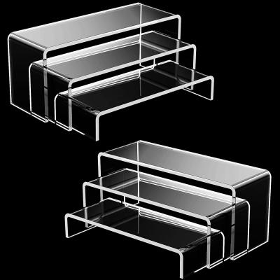 中国 アクリル式テーブルテーブルライザー U型スタンド 透明タブレットスタンド カップケーキ プレキシグラス 階段ライザー 販売のため