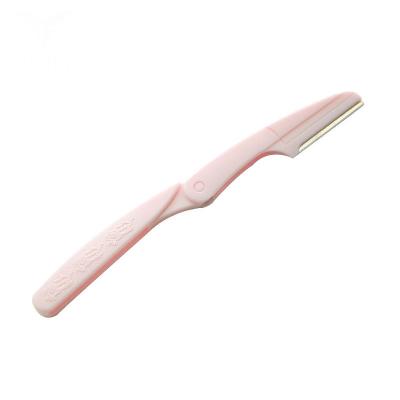 China Manual Mini Tinkle Ladies Eyebrow Trimmer Plastics Handle For Eye Beauty for sale