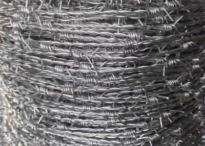 China 25kg Roll Silver Galvanized Razor Barbed Wire For Fence Home Security for sale