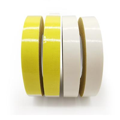 China Heat Resistant Double Sided Carpet Tape , Rough Surface Carpet Sealing Tape Yellow for sale