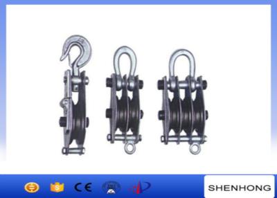 China Levantamiento del cable que tira el bloque de polea y cabestrante con la rueda del hierro para el peso Craning en venta