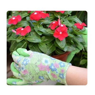 中国 子供緑の乳液のコーティングの仕事の手袋が付いている園芸タケ繊維のニット 販売のため