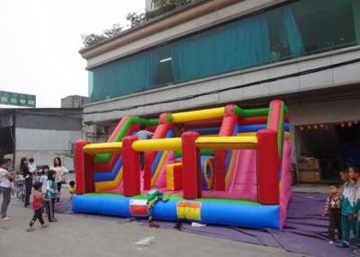 China Double Lane Commercial Inflatable Slide Obstacle And Playground Inside for sale