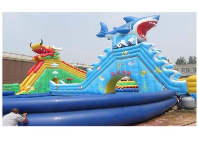 China 0.9MM PVC Tarpaulin Big Dragon / Shark Inflatable Water Park With Large Blue Swimming Pool for sale