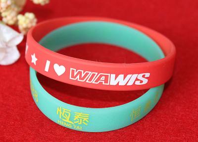 China Soft Feeling Printed Silicone Wristbands , Promotional Rubber Wristbands SGS Compliant for sale