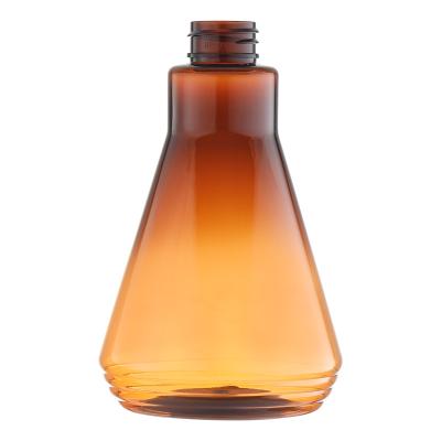 China Conical Customised Plastic Bottles Brown Transparent PET 400ml Shampoo Bottle for sale