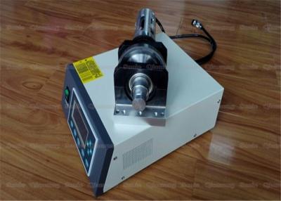 Chine la machine 35Khz de scellage non tissée ultrasonique, creusent la machine à coudre de tissu ultrasonique pour non le textile tissé à vendre