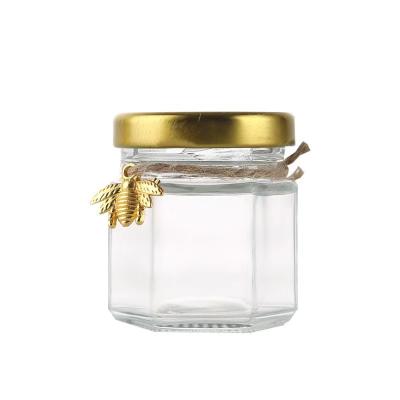 China Wholesale 1.5oz Mini 45ml Clear Party Favors Party Favors Honey Glass Jar Hexagonal Glass Honey Jar with Wooden Dipper for sale