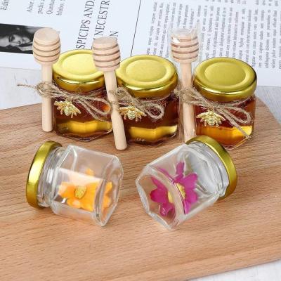 China Hot sale custom 1.5oz 45ml mini Hexagonal clear glass honey jar with dipper and gold lid for spice party gift jam jelly for sale