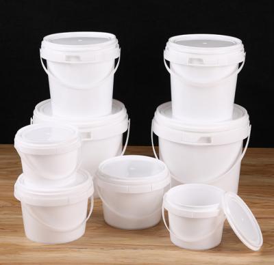 China Baldes redondos de plástico de qualidade alimentar empilháveis reutilizáveis com capacidade de manuseio 1L-5L à venda