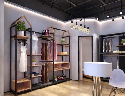 China Freestanding Clothing Display Racks Clothing Store Displays Metal / MDF Material for sale