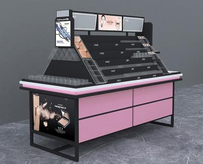 中国 1650mmのピンクの反対の化粧品の表示棚は中間の島のショーケースを映す 販売のため