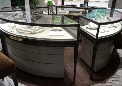China Bronze Stainless Steel Jewelry Store Showcases Arc Shape With Bottom Cabinet for sale