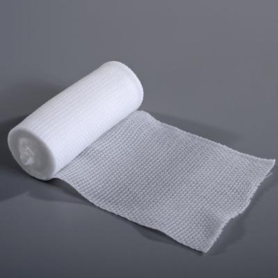 China Medical Gauze Premium Breathable Stretched PBT Bandage Transfix Elastic Bandage For First Aid à venda