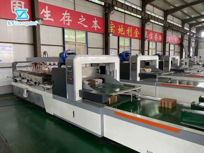 China Clapboard Carton Box Machine , 70mm-250mm corrugated partition assembler machine for sale