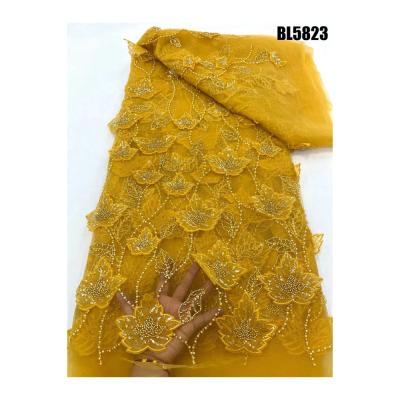 China Middle East Muslim new embroidery fabric beaded lace  african french lace fabric women dress wedding bridal lace Ghana dress for sale