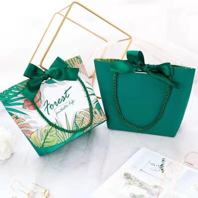 China Tropical Plant Print Lime Green Paper Bags With Ribbon Handles for sale