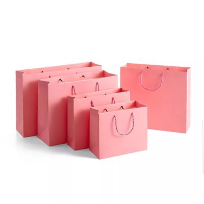 China ISO Offset Printing Clothing Paper Bags Underwear Cinnamon Pink Paper Bag for sale