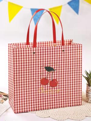 China OEM ODM Matte Lamination Apparel Art Paper Bag With Handle for sale