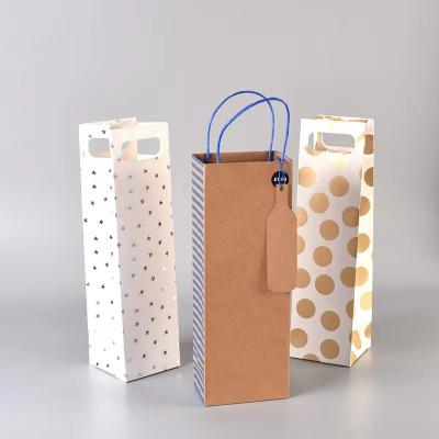 China 12.5x11x33.6CM Gold Printed Wine Bottle Paper Bags Customized for sale