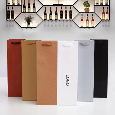 China 157gsm Insulated Washable Brown Paper Wine Bags Die Cut Handle for sale