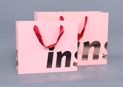 China Pantone colorea el bolso del regalo de la promoción de la impresión en offset de las bolsas de papel de Kraft del zapato de la ropa en venta