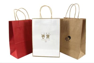 China Brown branco 250gsm Kraft imprimiu os sacos de compras de papel com punhos à venda