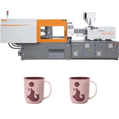 China Máquina de moldeo por inyección de color naranja para la producción de tazas de plástico de alta precisión en venta