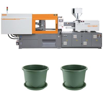 China OUCO 130T Hydraulic Servo Lightweight And Breathable Plastic Flower Pot Injection Molding Machine for sale