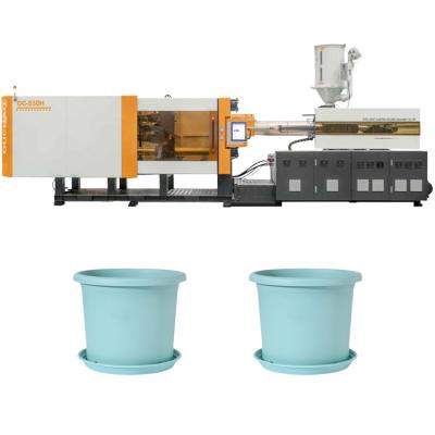 Cina 550T macchina per lo stampaggio a iniezione con struttura a blocco centrale per la produzione di vasi da fiore fini. in vendita