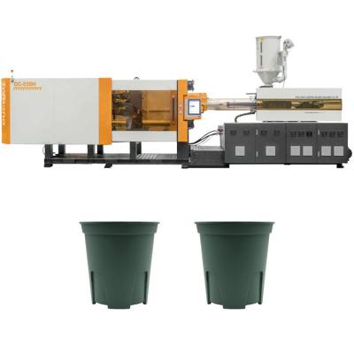 China Customizable Highly Responsive Production Flower Pot OUCO 550T Servo Hydraulic Injection Molding Machine à venda
