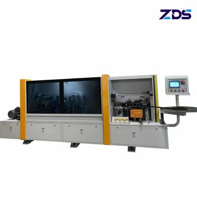 China Straight Line Automatic Edge Banding Machine 10mm To 60mm Thick Panel Edge Bander for sale