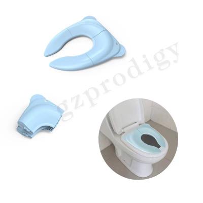 China Compact Size Easy Carry Baby Potty Training Seat Foldable Potty Seat Cover en venta
