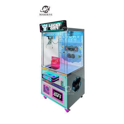 Cina Macchine per gru interne Giocattoli di peluche Giochi arcade Monete Operare Macchina di artigli per giocare in vendita