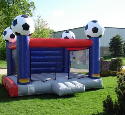 China Kids Sport Game Soccer Blow Up Bounce Houses With Safety Net for sale