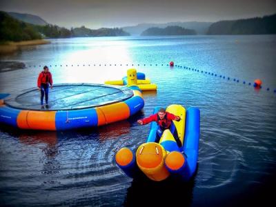 China Water Jump Trampoline And Seasaw Water Blow Up Toys For Water Park for sale
