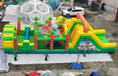 China Tarpaulin Inflatable Obstacle Course With Dinosaur Animals Trampoline Insane Run Obstacles for sale