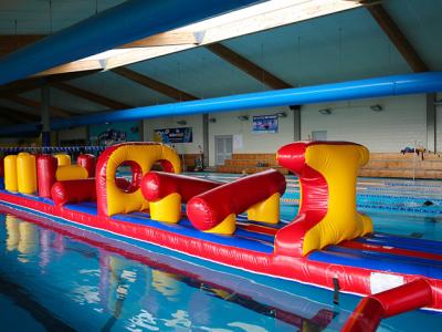 China 54 FT Long Giant Water Inflatable Obstacle Course With Slide Durable 0.9mm PVC for sale